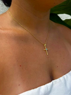 14k gold plated cross with blue gem accent